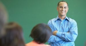 Professor smiling in class