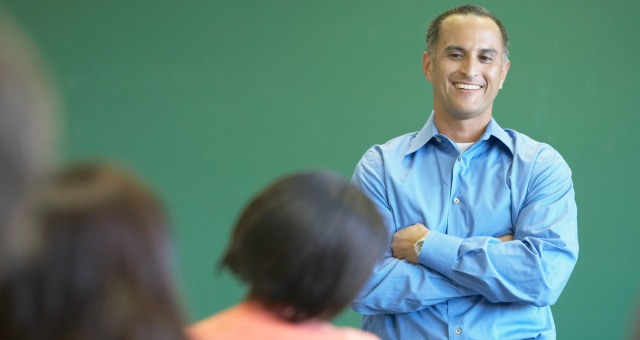Professor smiling in class
