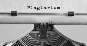 Word plagiarism written on piece of paper with typewriter