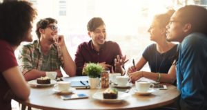 Students gather at coffee shop to discuss course