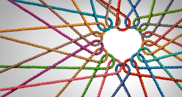 Colored strings bond together to form heart and connection