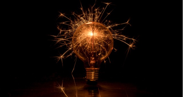 Lightbulb creates spark and ominous glow