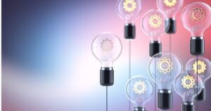 Lightbulbs with ombre background and gears