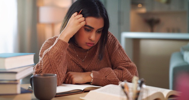 Student looks stressed while studying