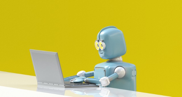 Robot with laptop typing