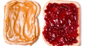 Open faced peanut butter and jelly sandwhich