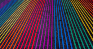 Rainbow lines painted on a road