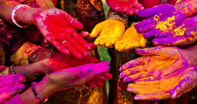 Festival in India with colored powder on hands