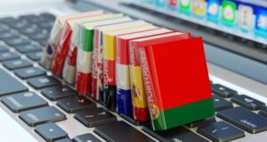 Culturally diverse group of books with different countries on top of a keyboard