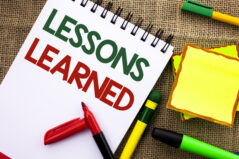 Writing note showing Lessons Learned. Business photo showcasing Experiences that should be taken into account in the future written Notebook Book the jute background Sticky Note Papers Pens