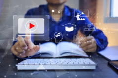 E-learning concept to graduation and earning a certificate program. Student hand touch virtual screen of online education via computer, having knowledge in college able to work like a professional