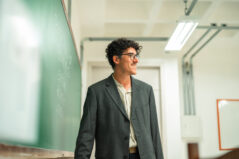New faculty, university professor teaching in a classroom