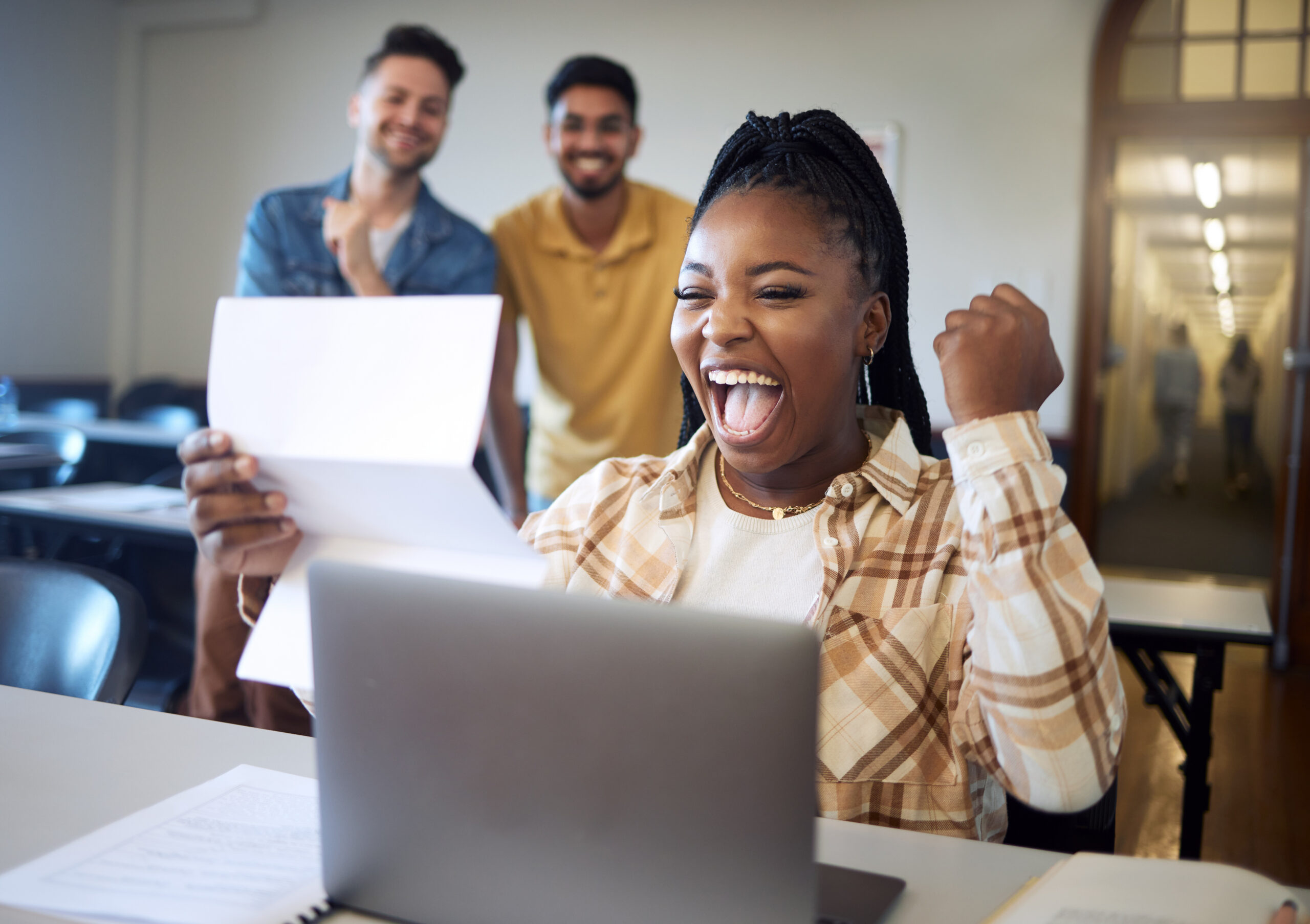 University, black woman demonstrating student success, reading exam feedback or school loan. Happy, smile or friends for education goals, college test report or achievement letter in classroom